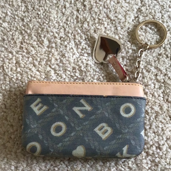 Dooney and Bourke coin purse with key ring. - Picture 2 of 2